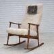 1970s, Danish rocking chair, reupholstered in quality genuine sheepskin.