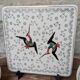 Dessous de plat et 2 dessous de bouteille Longwy modèle Chypre