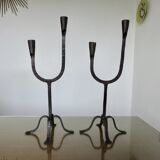 Pair of antique wrought iron candlesticks