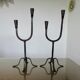 Pair of antique wrought iron candlesticks