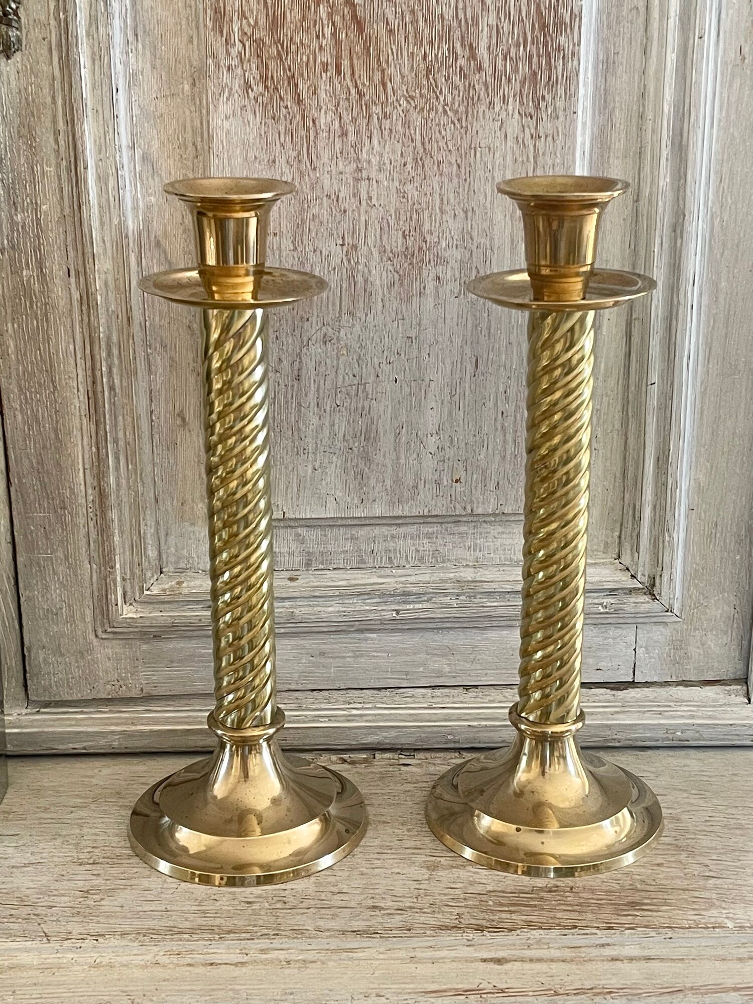 Pair of twisted brass column candle holders