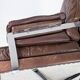 Chaise facile rembourrée avec cuir brun patiné et cadre en métal, conçu par Arne Norell