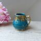 Old small Sadler cream pot in blue-green ceramic with a gold pattern, English milk jug.