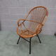 Fauteuil rotin pied métal années 60