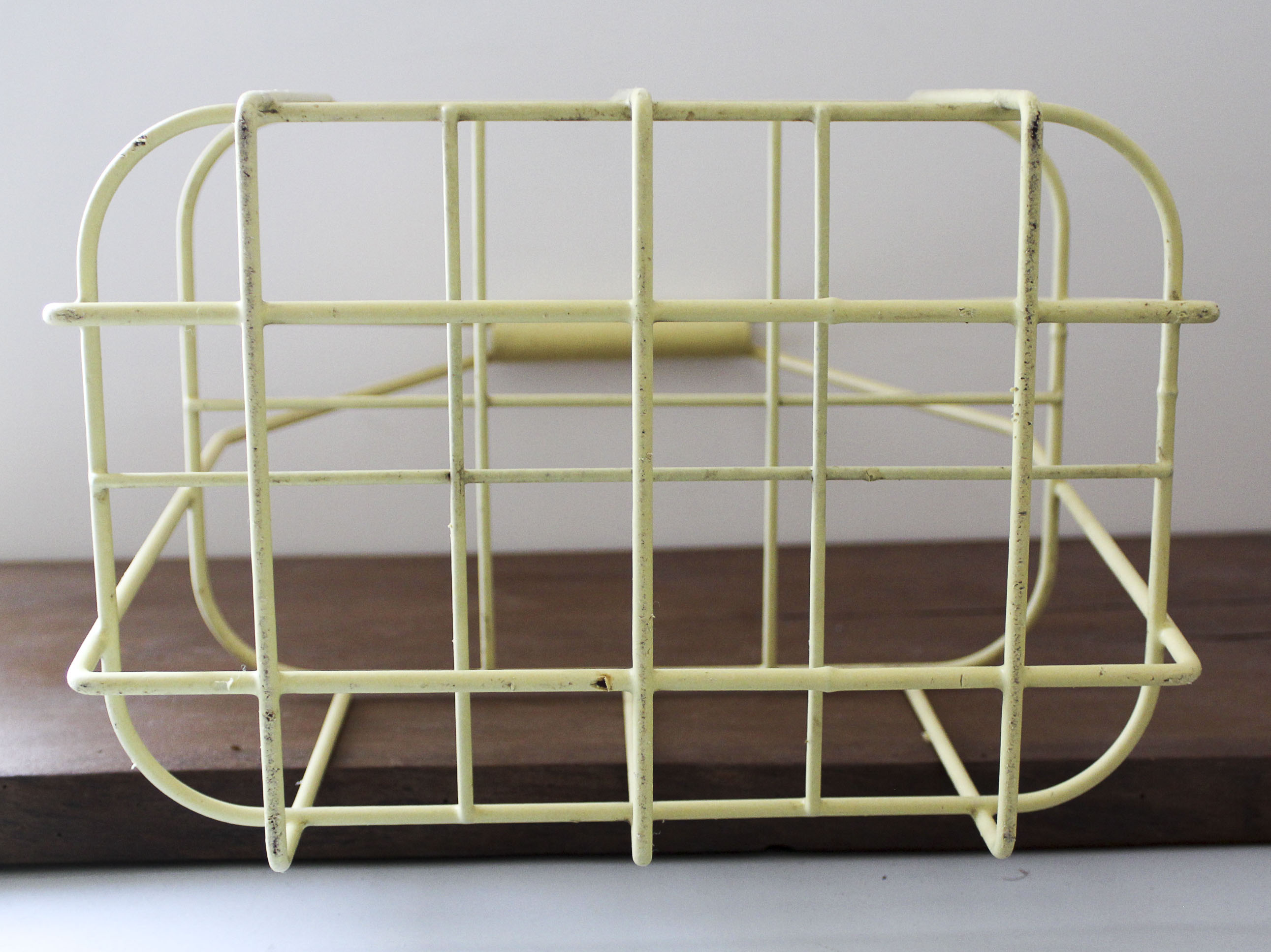 Yellow metal bottle holder