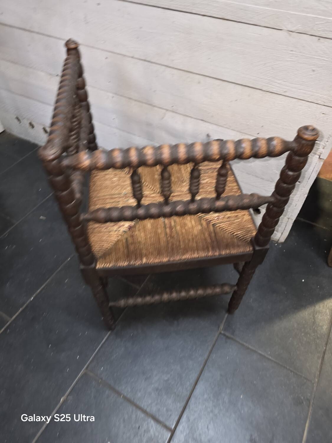 Antique corner fireplace armchair