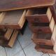 Vintage double-sided mahogany desk with 18 drawers.