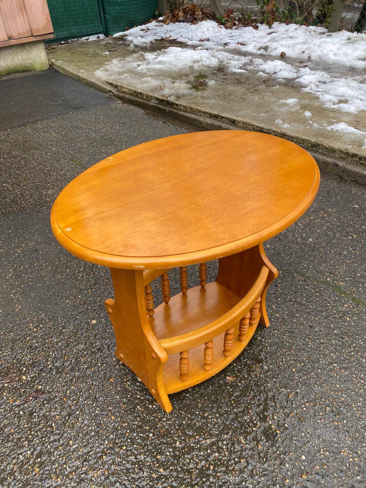 Round oval side table in carved solid wood from the 20th century.