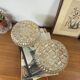 Pair of amber glass ceiling sconces with small vintage flowers.