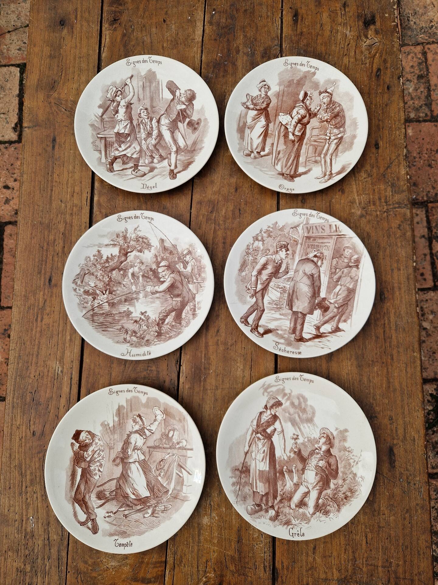 Set of 6 earthenware plates from Sarreguemines U&C Signs of the Times.