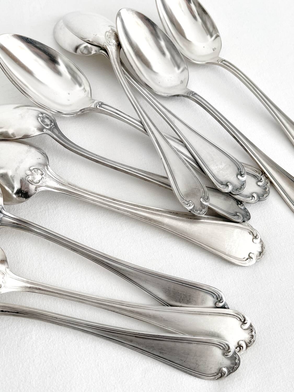 12 antique silver plated shell soup spoons