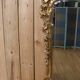 Golden wooden mirror in Louis XV style