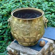 Large brass lion planter with a hallmark from the 19th century.