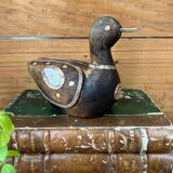 Bird in dark wood, brass & mother-of-pearl