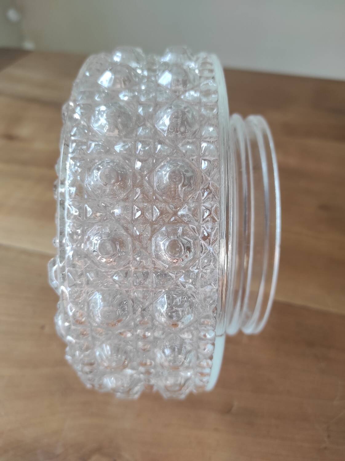 Glass ceiling light globe with relief decoration