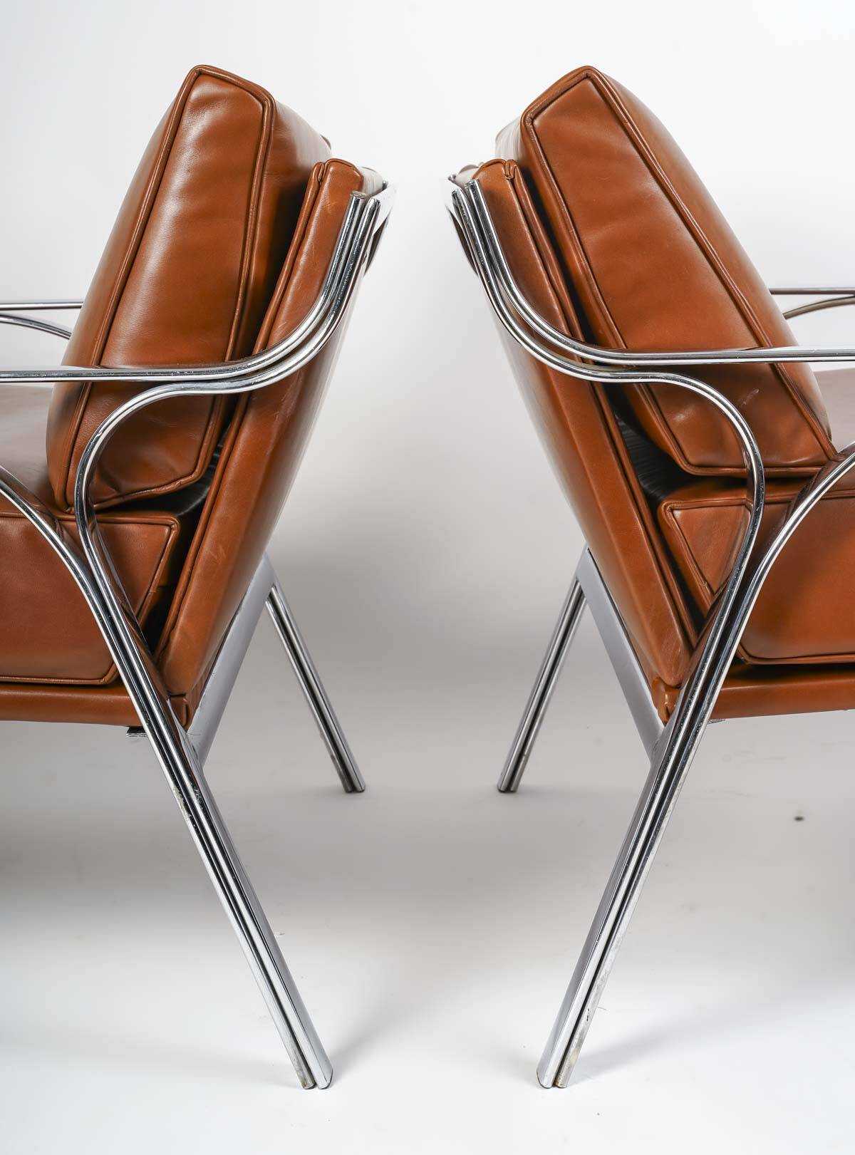 Pair of metal and leather armchairs from the 60s