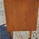 Vintage golden oak sideboard with conical legs from the 1950s