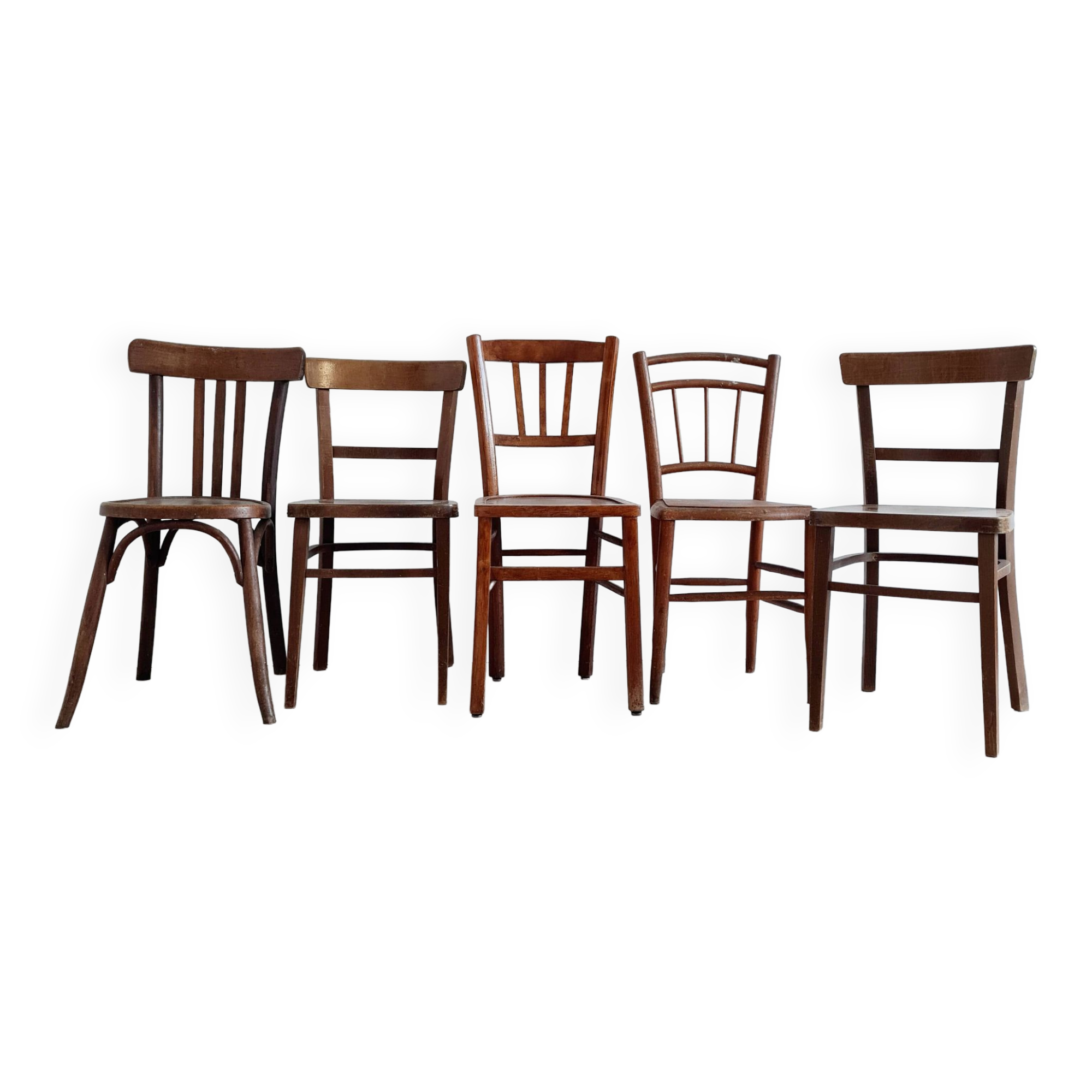 Mismatched wooden bistro chairs