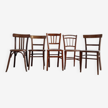 Mismatched wooden bistro chairs