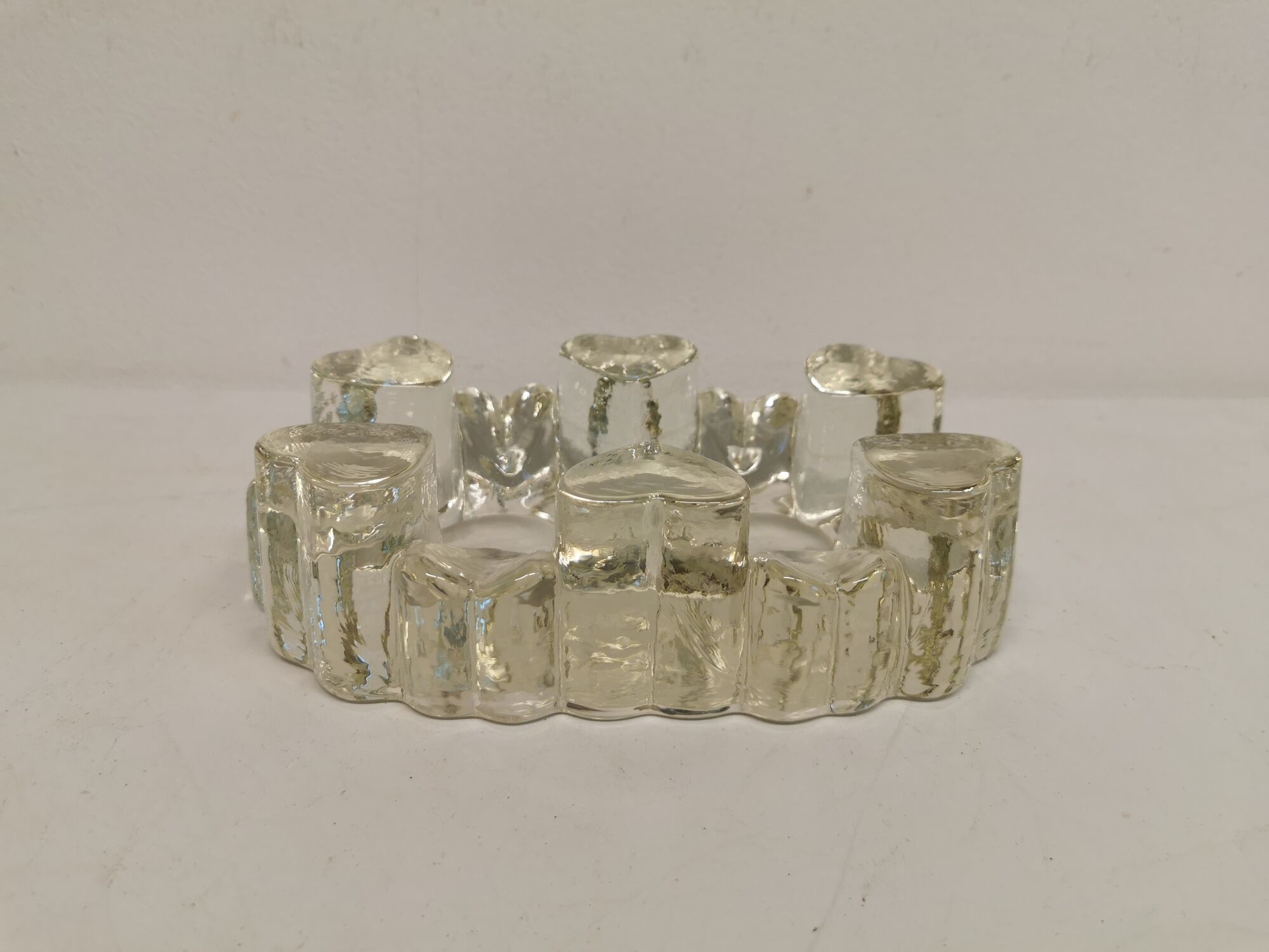 Candlestick in hard pressed glass with space for two candles