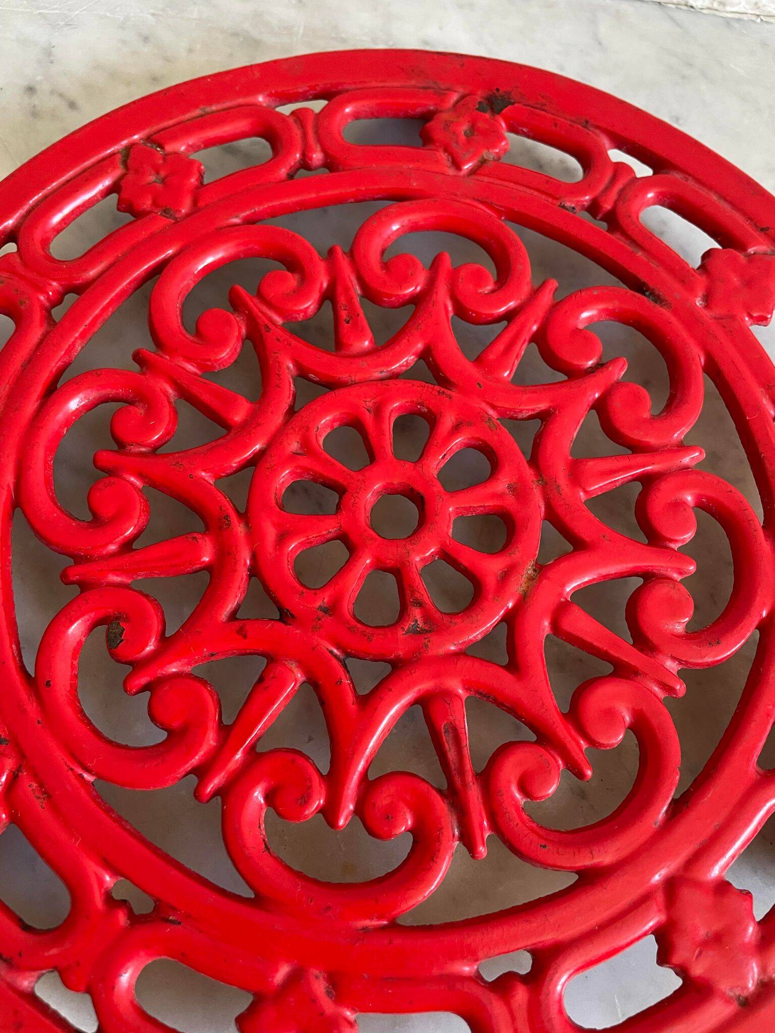 Vintage red Decotec enameled cast iron trivet