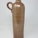 Old stoneware bottle with handle