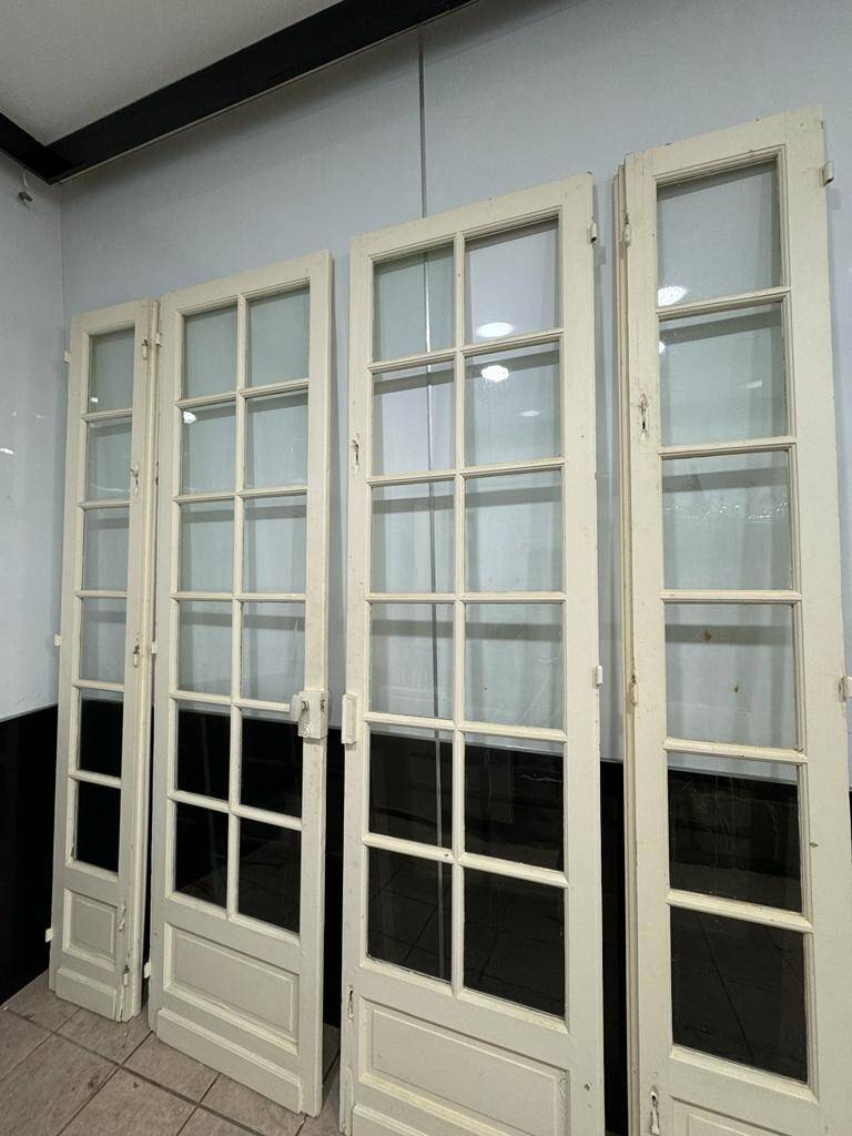 Double glass door in the living room of a Haussmannian apartment