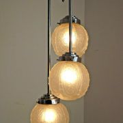 french art deco light in chrome with 3 floral opaque glass shades