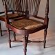 Paire de fauteuils d'angle paillés Jungerstil en acajou 1900.