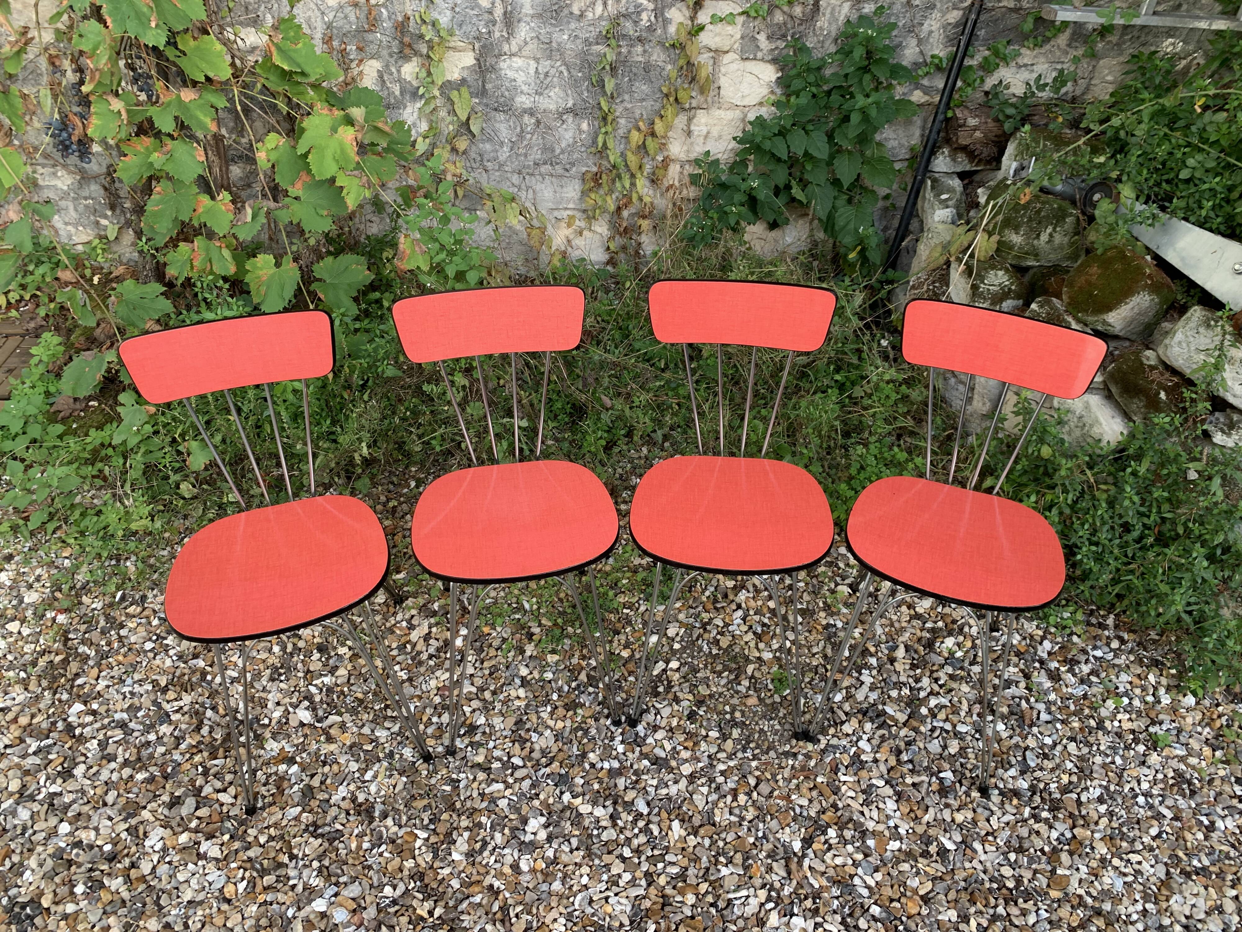 4 red Formica chairs with Eiffel legs, 1950s