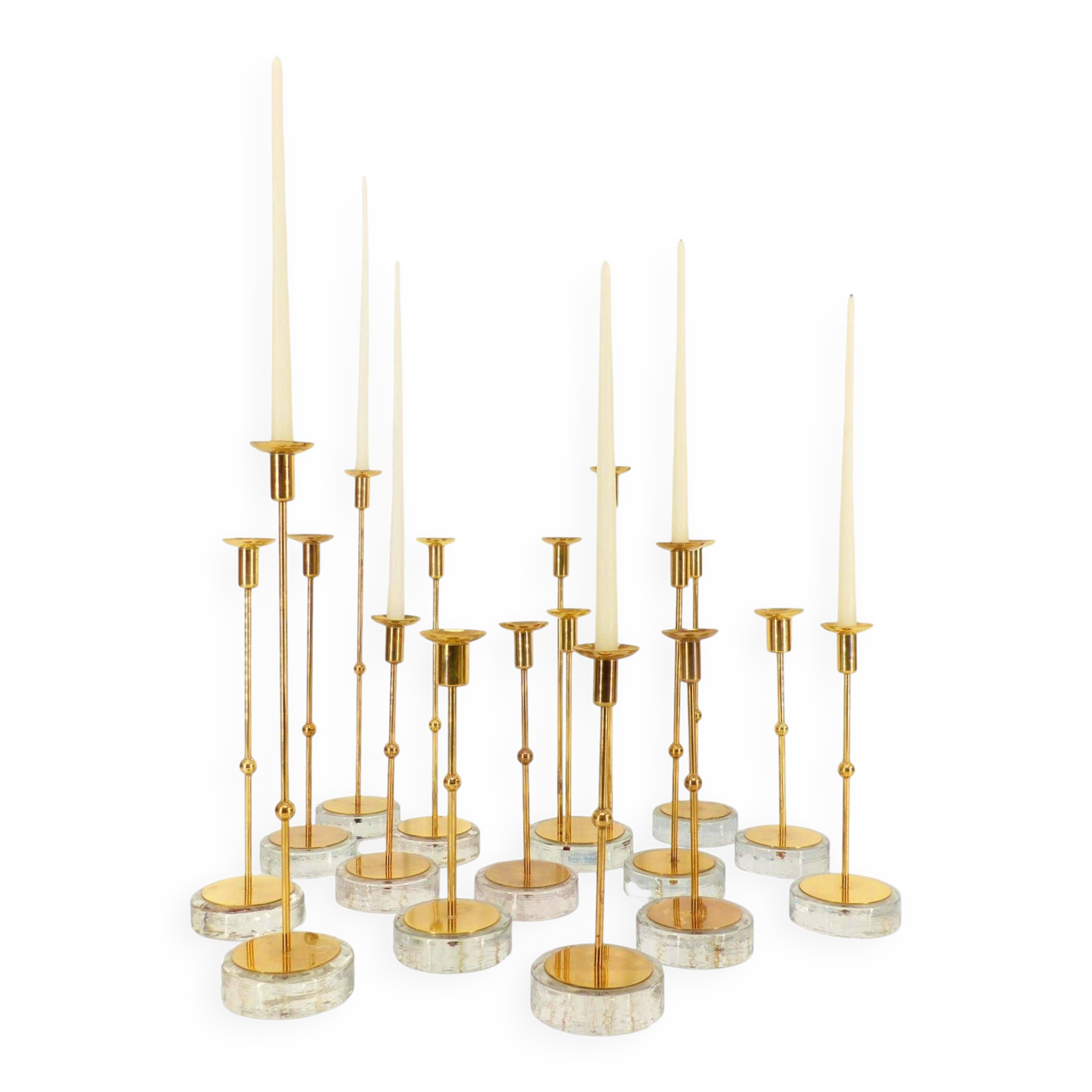 Set of 15 Scandinavian candle holders in brass and glass, Gunnar Ander, Ystad Met