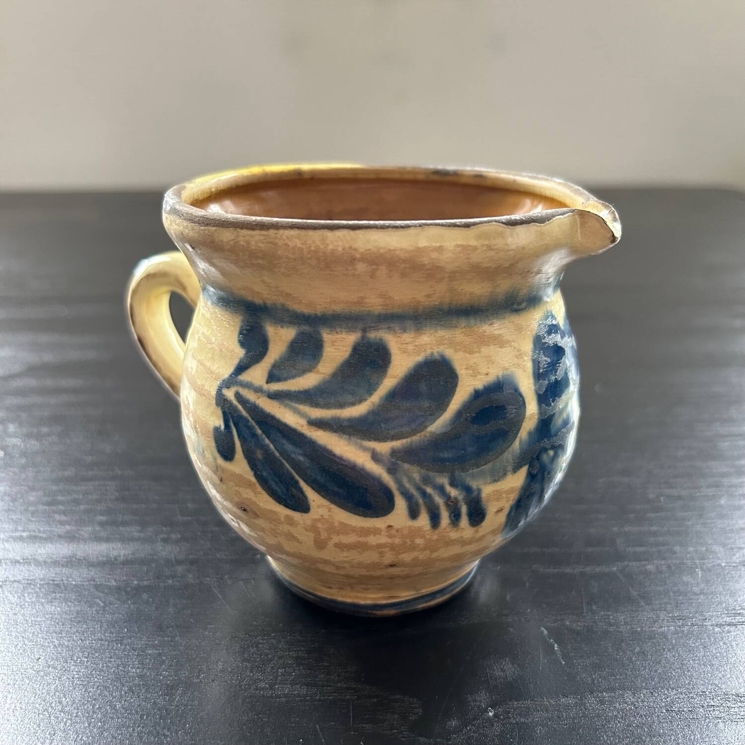 Pitcher with blue floral decor