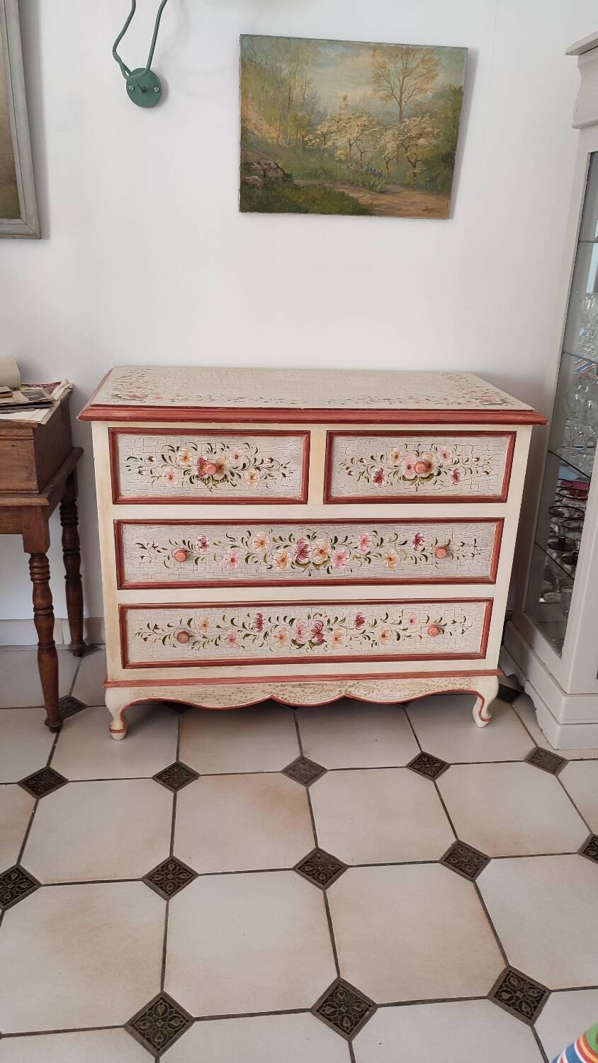 Painted chest of drawers with floral decoration