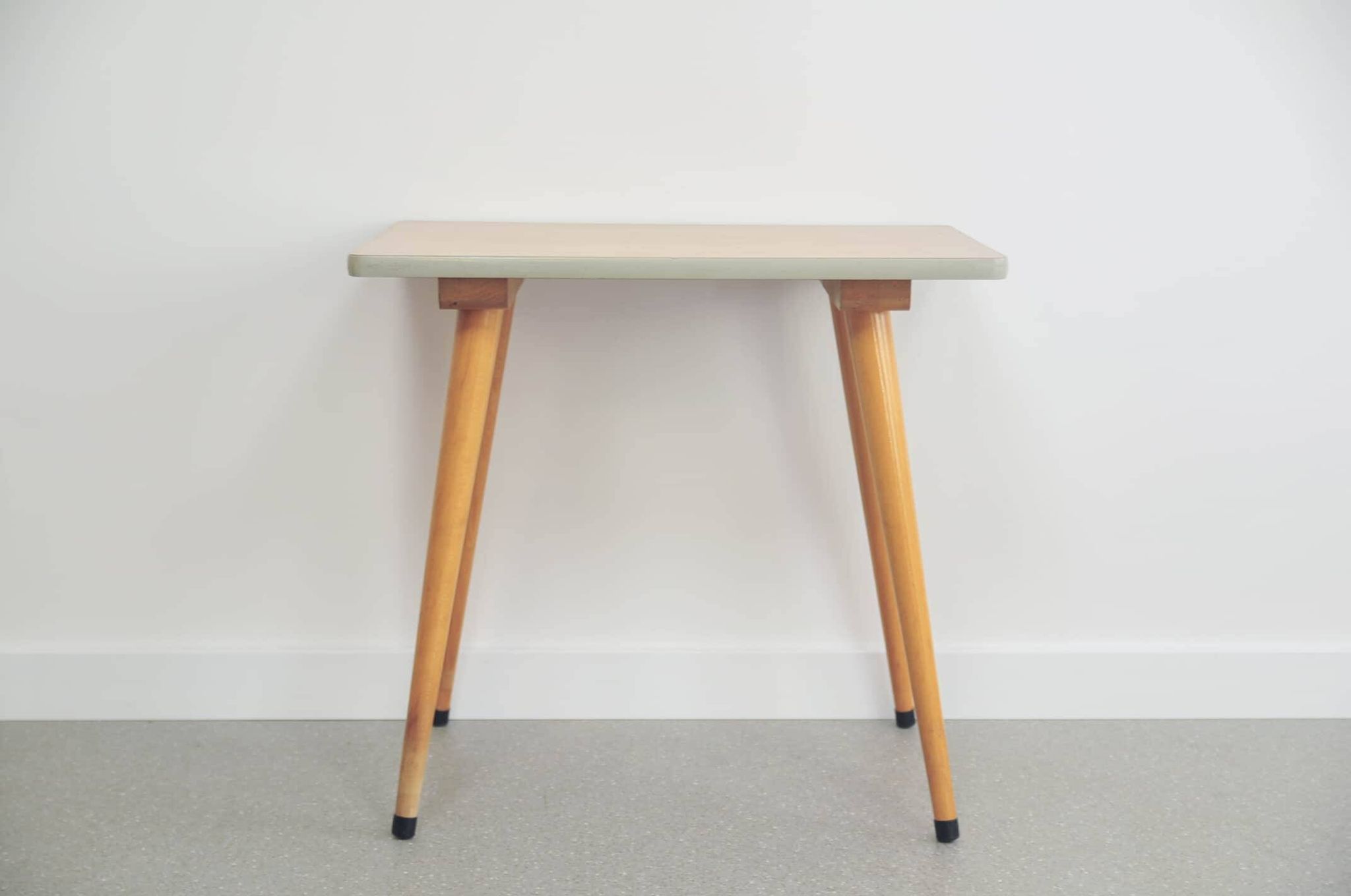 Vintage wooden table with conical legs