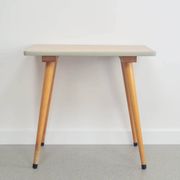 Vintage wooden table with conical legs