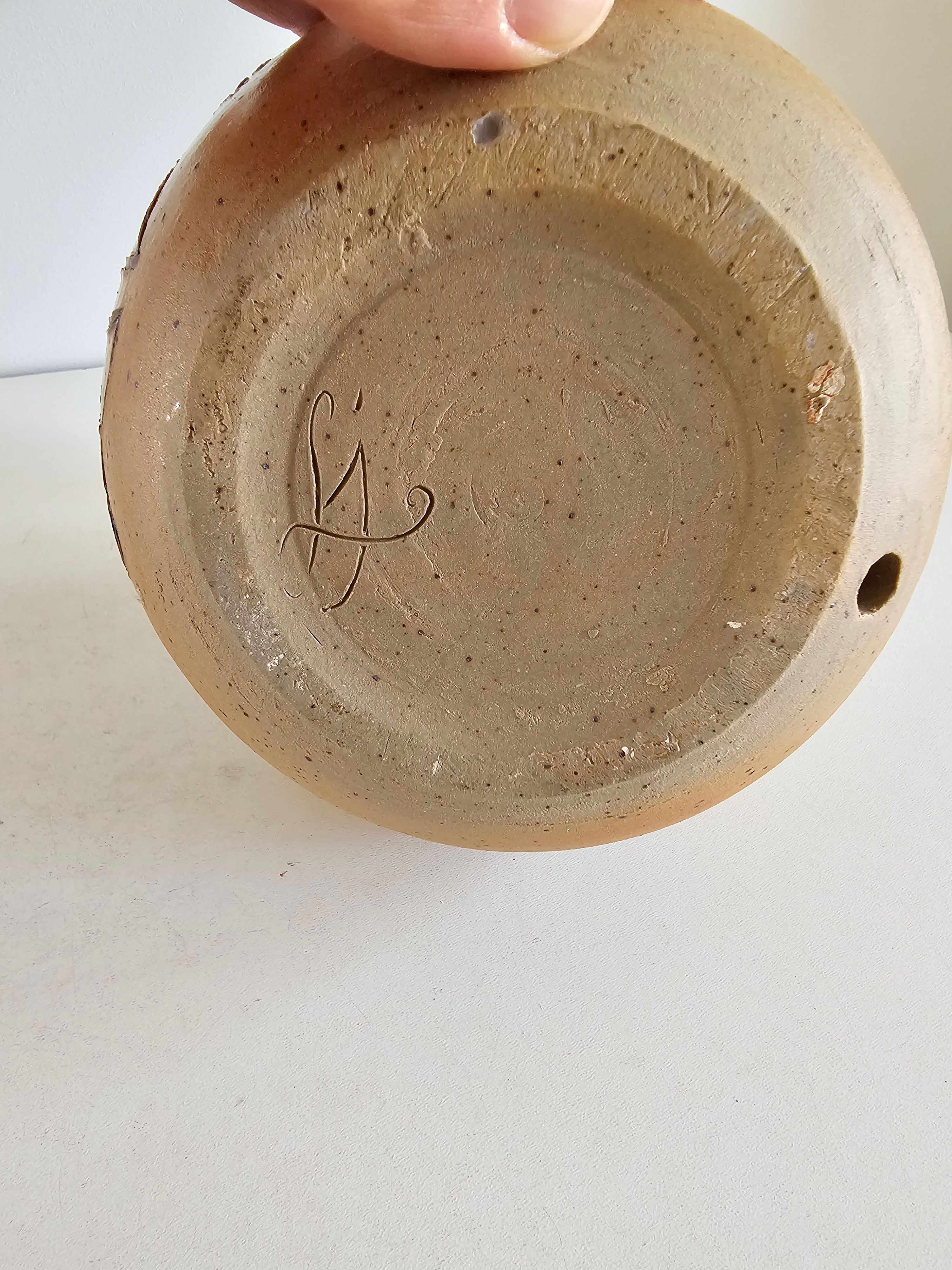 Ceramic lamp base with floral pattern, signed.