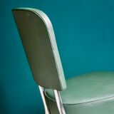 Office chair in green skaï