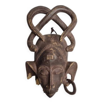 Senufo Kpelie mask in carved wood, Ivory Coast, 20th century, 30 x 18 cm