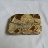 Marble pocket ashtray with fossil ammonite
