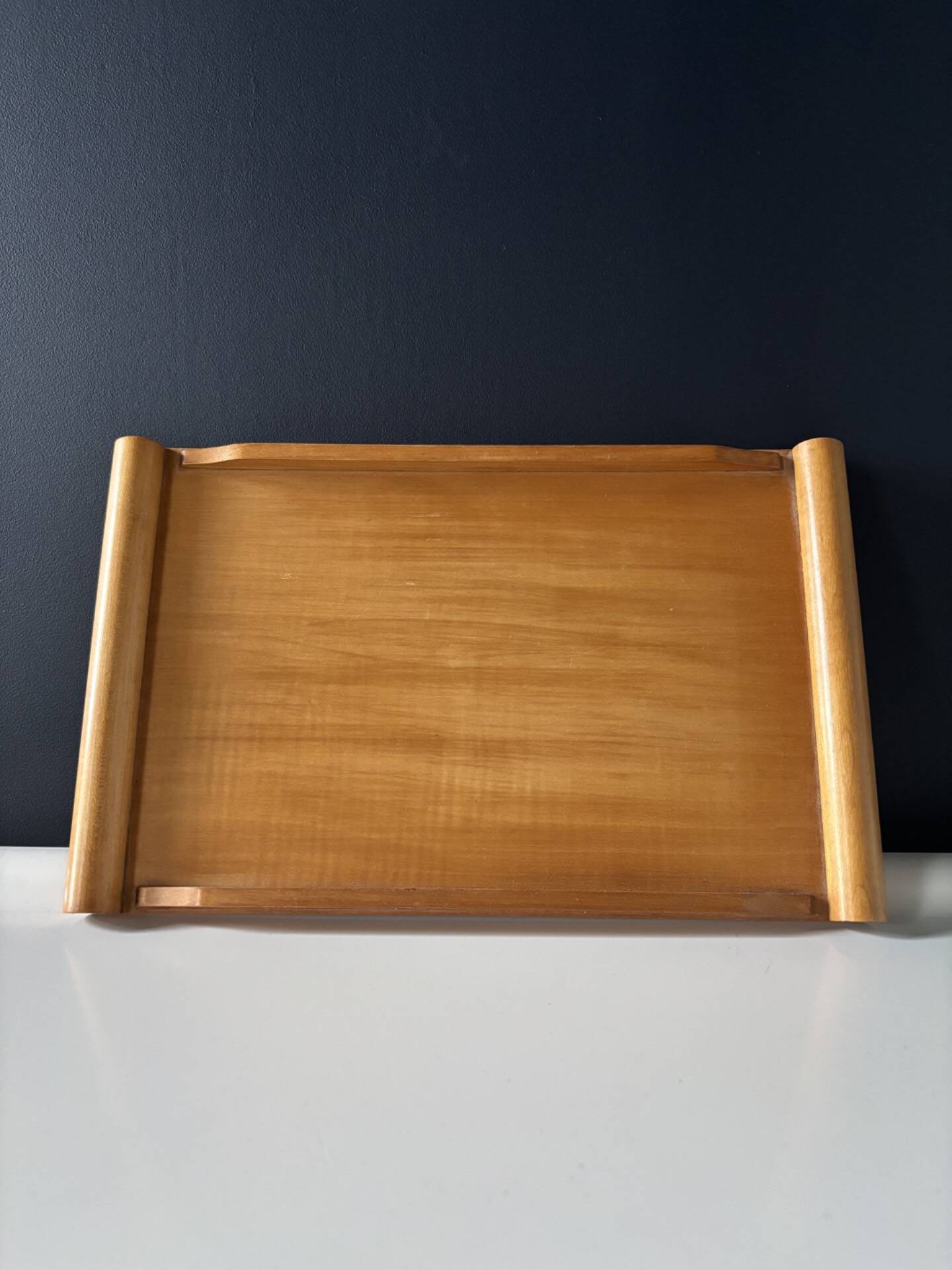 Vintage wooden plateau in Scandinavian style from the 60s — cylindrical handles.