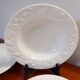 Set of 6 white ceramic deep plates made in Italy.