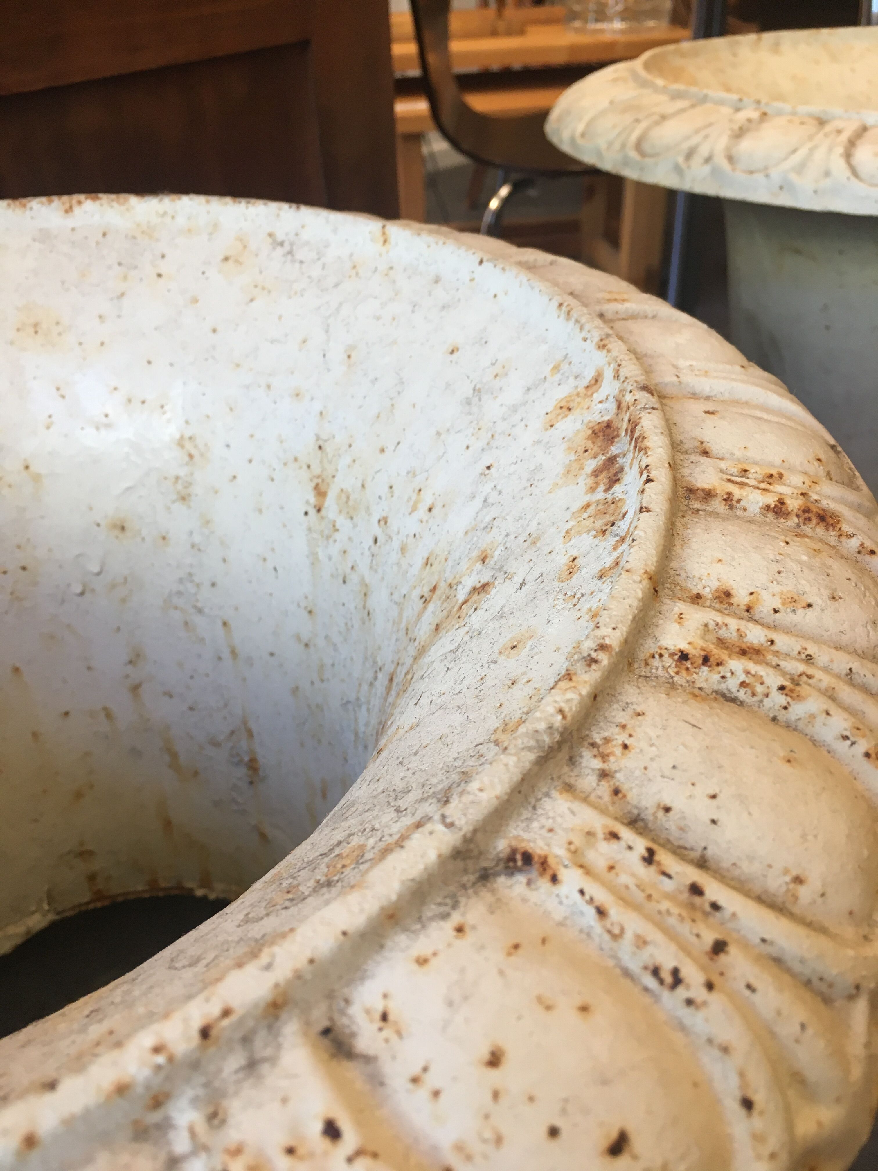 Pair of medicid vasques, cast, exterior