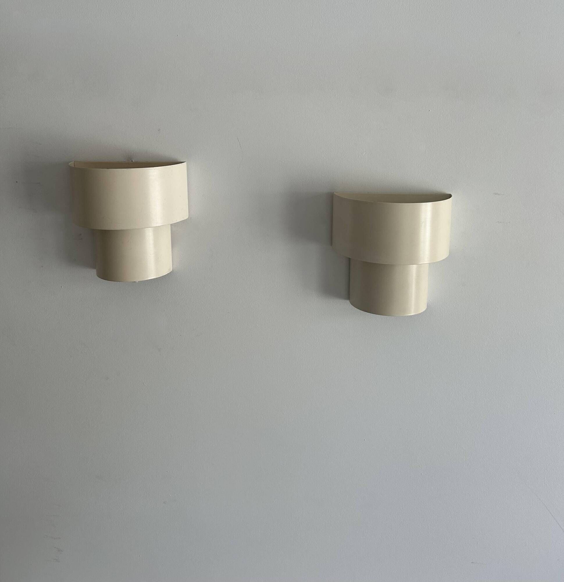 Pair of vintage modernist wall lights, white lacquered metal, Sweden 1970