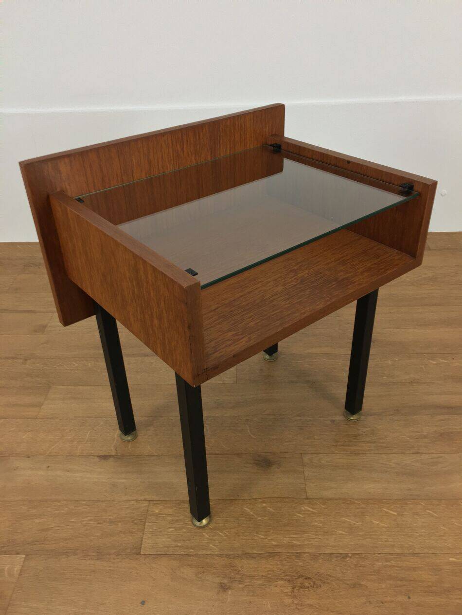 Modernist bedside table from the 1950s, wood and glass.