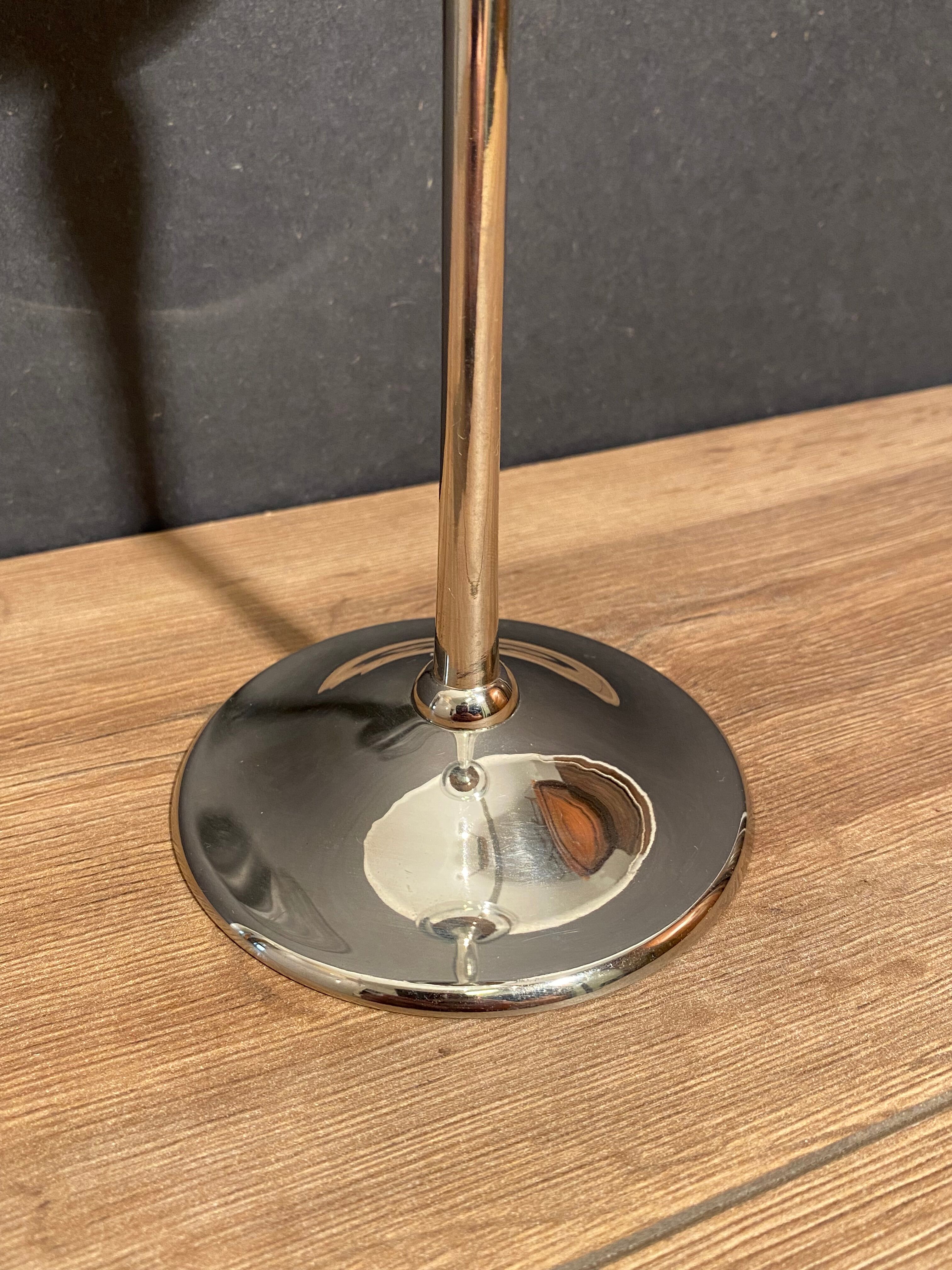 Glass photophore on high metal stand with silver patina