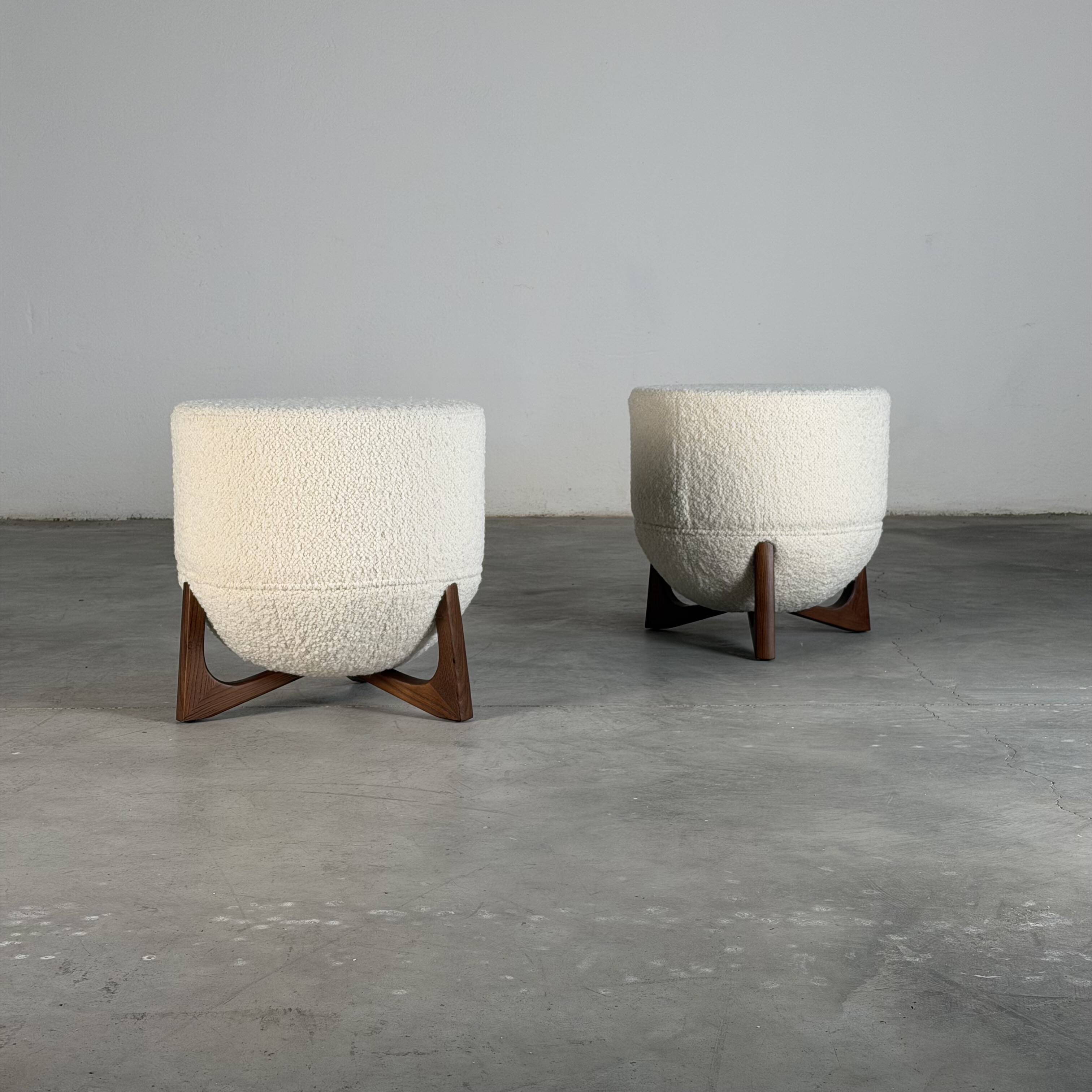 TOTEMO stools by FORME with ivory Dedar bouclé upholstery and walnut legs.