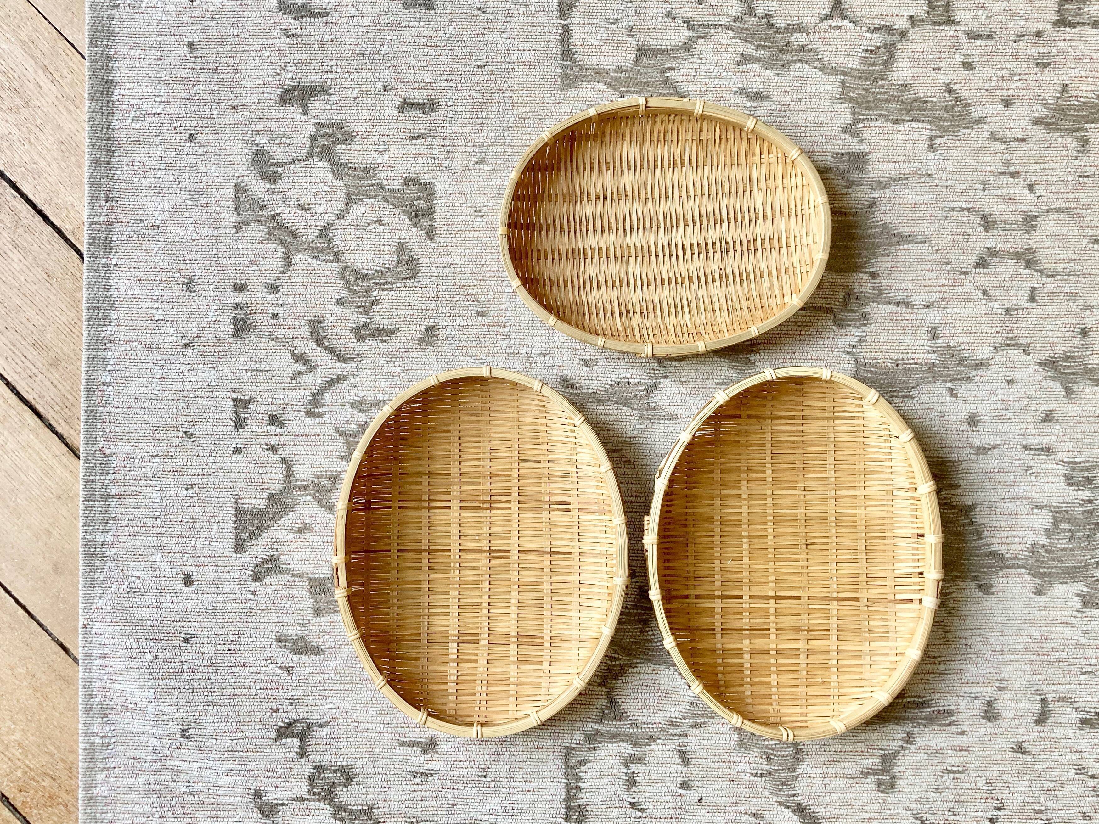 Three trundle baskets