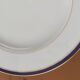Six blue and gold Limoges porcelain dinner plates