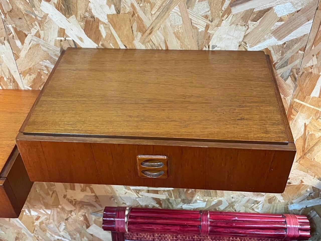 Suspended teak bedside tables in vintage 1960s Scandinavian style.