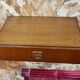 Suspended teak bedside tables in vintage 1960s Scandinavian style.